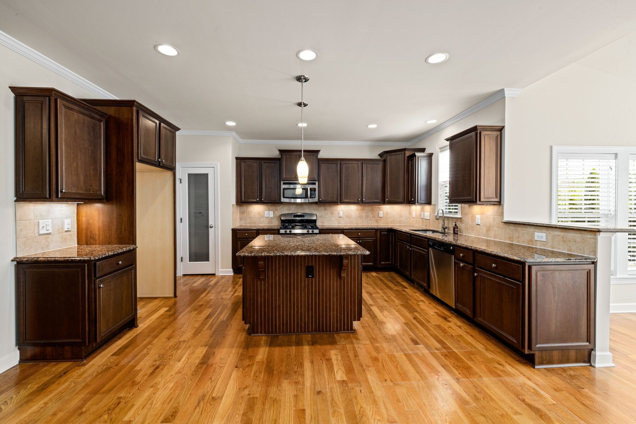 Warm Wood Harmony Kitchen Remodel by Battlefield Home Services - Kitchen & Bath Remodeling project photo
